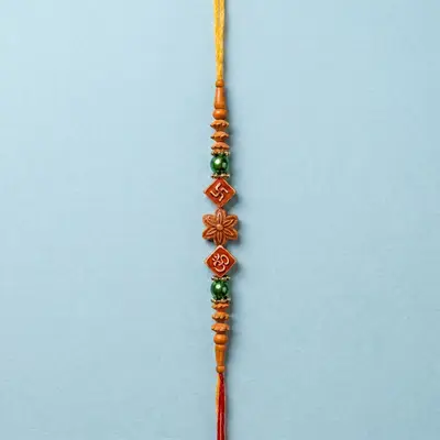 Traditional Wooden Rakhi with Om and Swastika